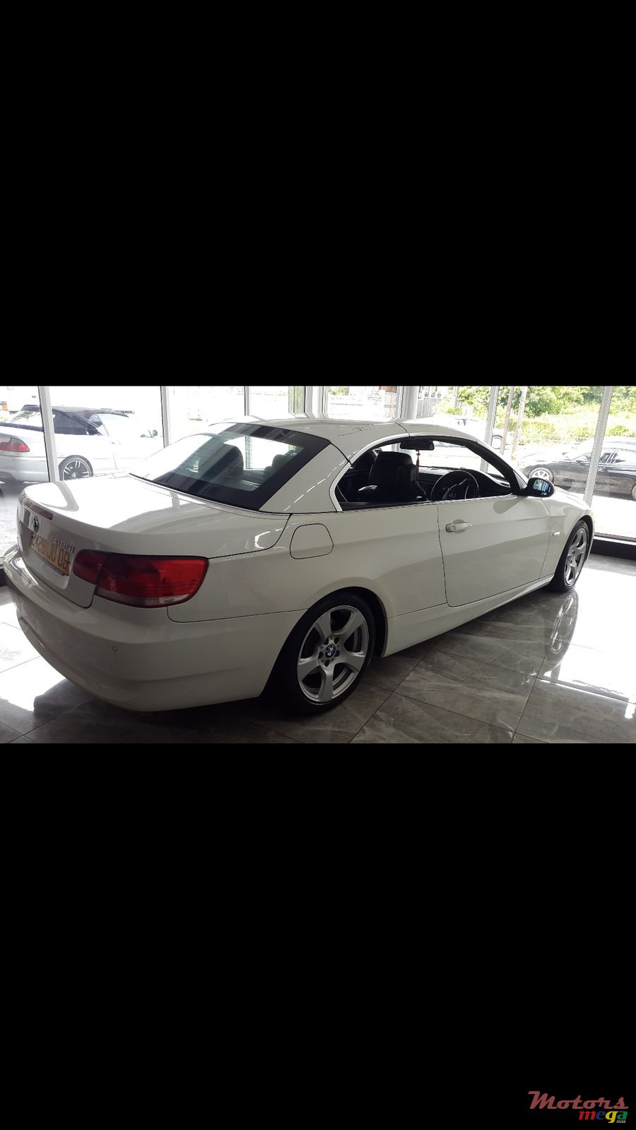 2009' BMW 3 Series Convertible 325 i photo #2