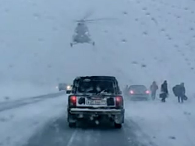 Helicopter Lands on Russian Highway