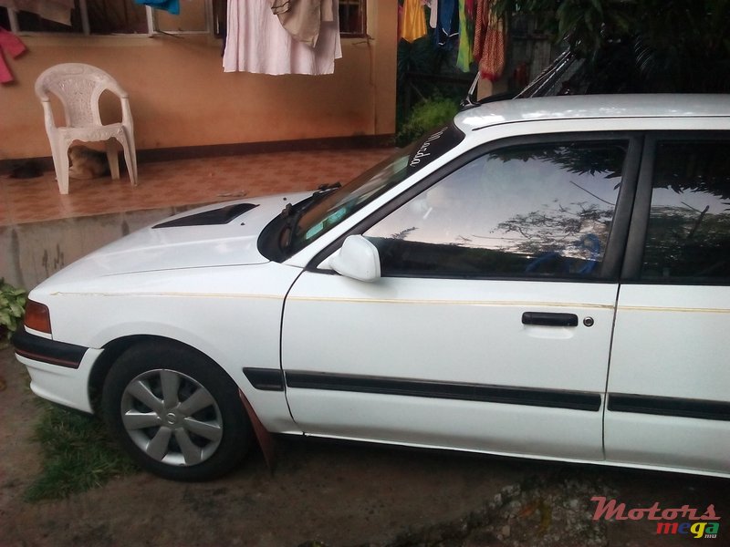 1994' Mazda 323 photo #3