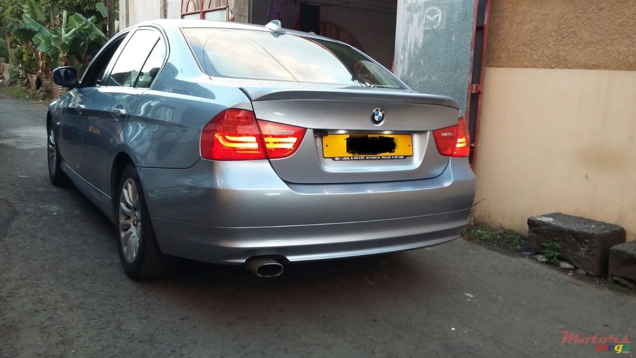 2009' BMW 316 photo #1