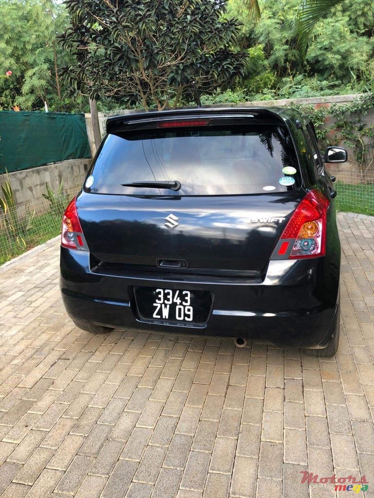 2009' Suzuki Swift photo #3