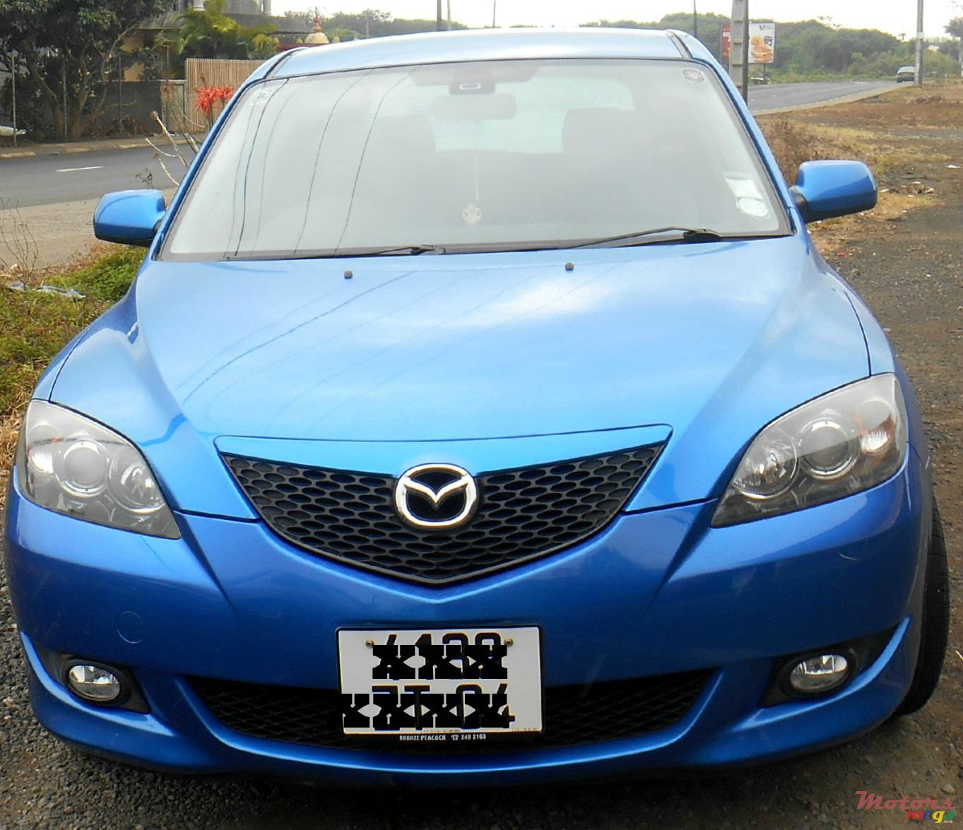 2004' Mazda Axela photo #1