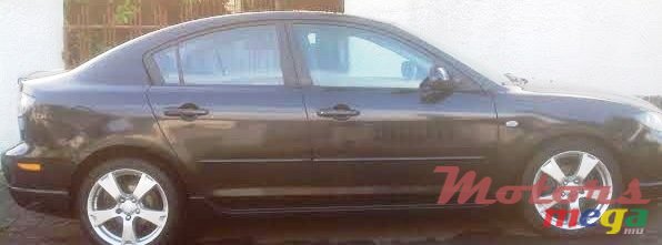 2004' Mazda 323 photo #1