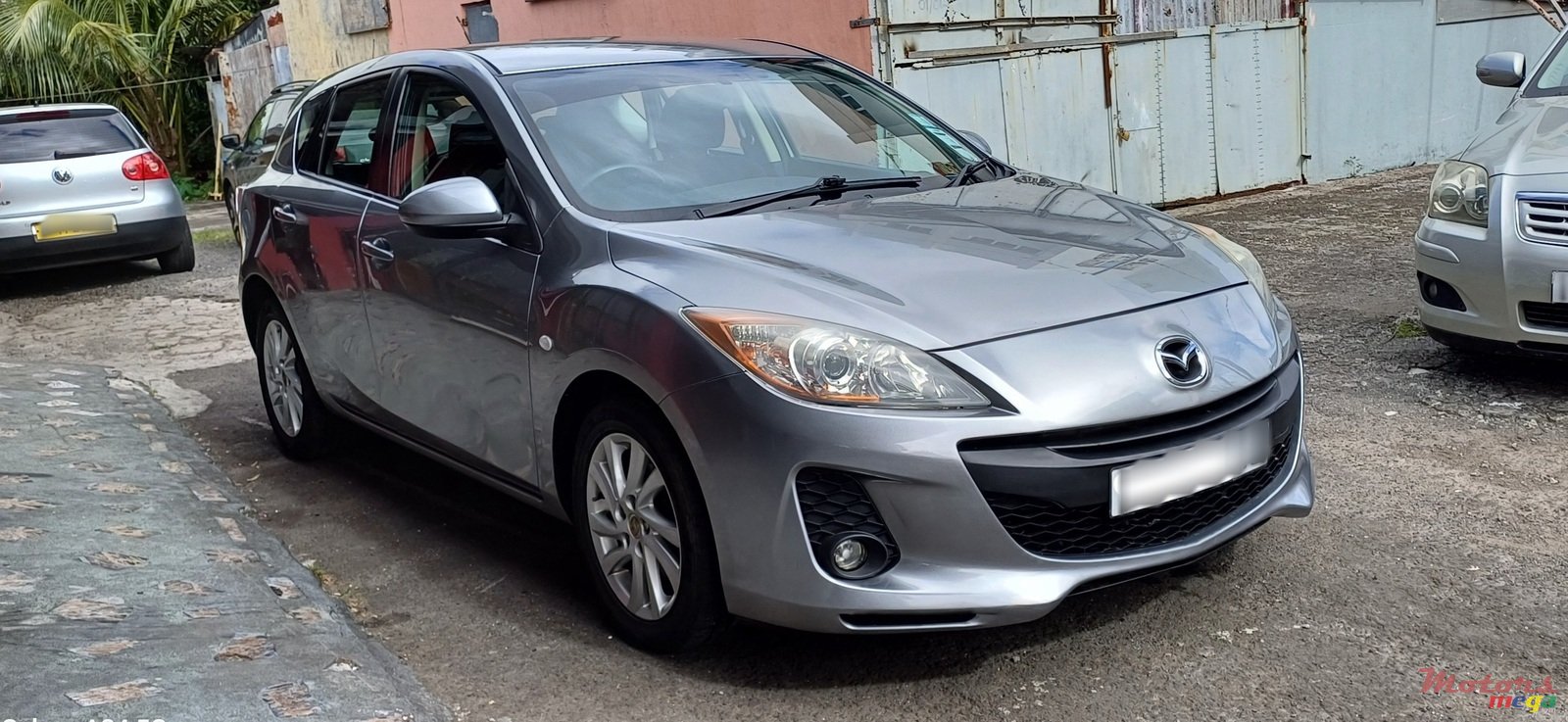 2013' Mazda 3 photo #1