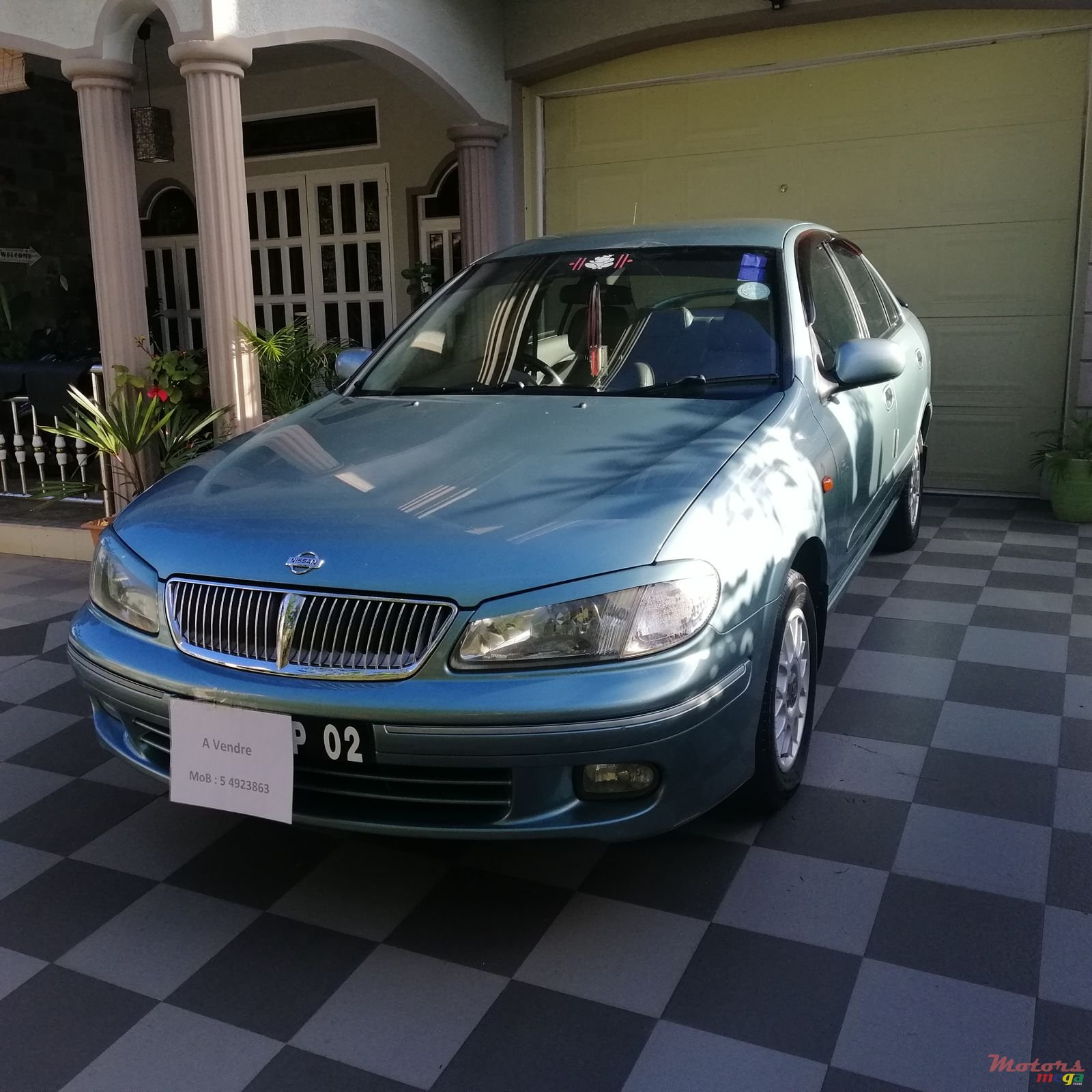 2002' Nissan Sunny photo #1