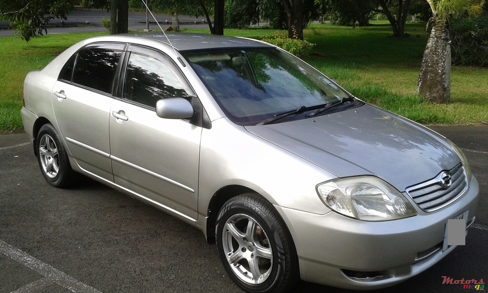 2004' Toyota Corolla Nze Grade X photo #1