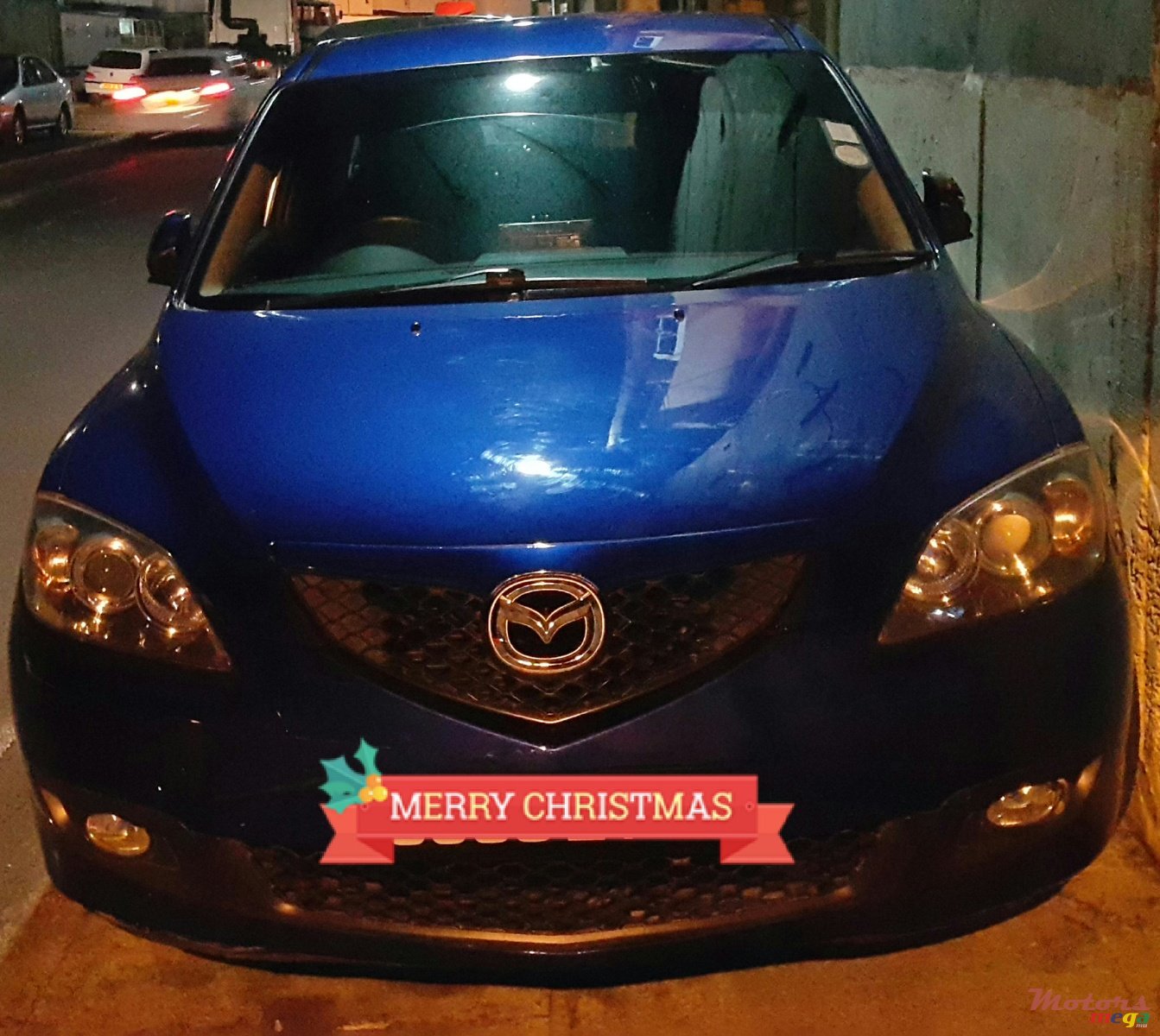 2007' Mazda Hatchback photo #1