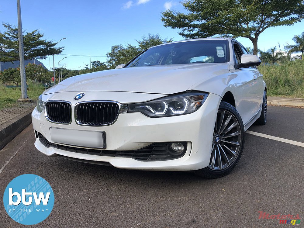 2012' BMW 318 photo #2