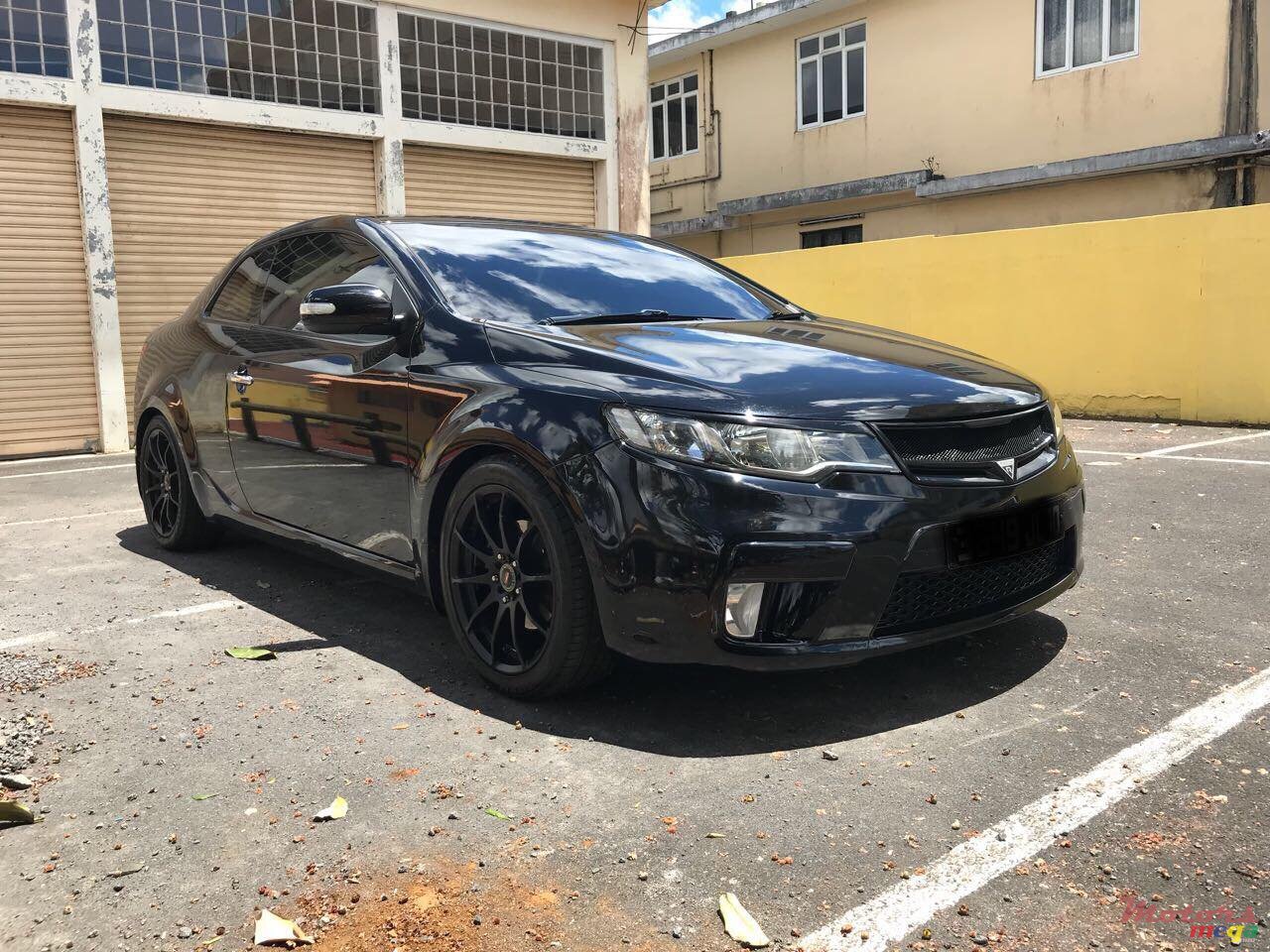 2010' Kia Koup sport photo #1