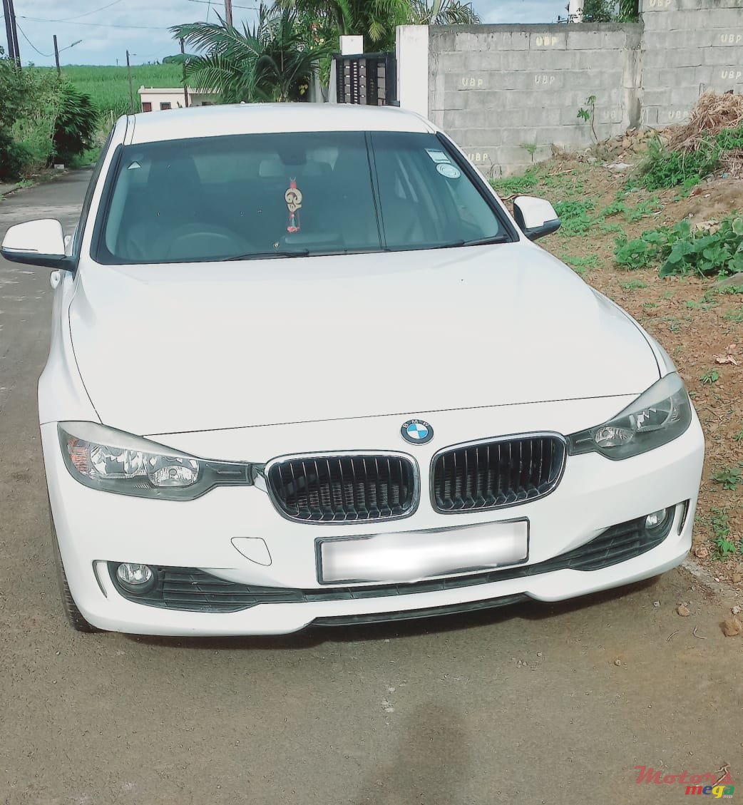 2013' BMW 116 photo #1