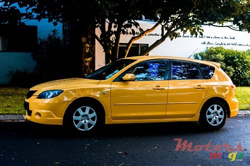 2004' Mazda 3 photo #1