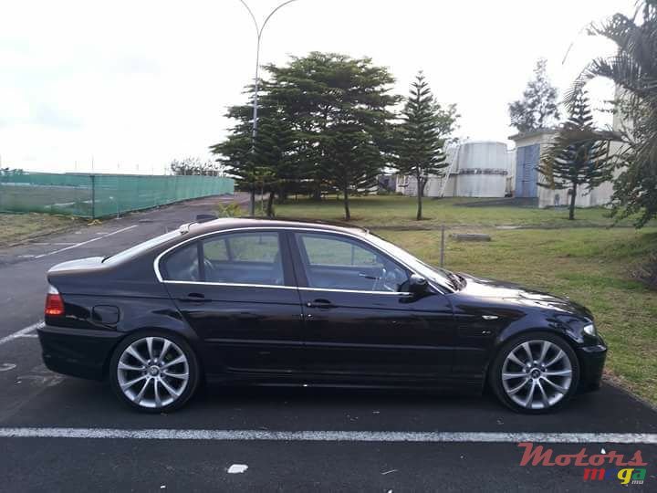 2004' BMW 318 photo #1