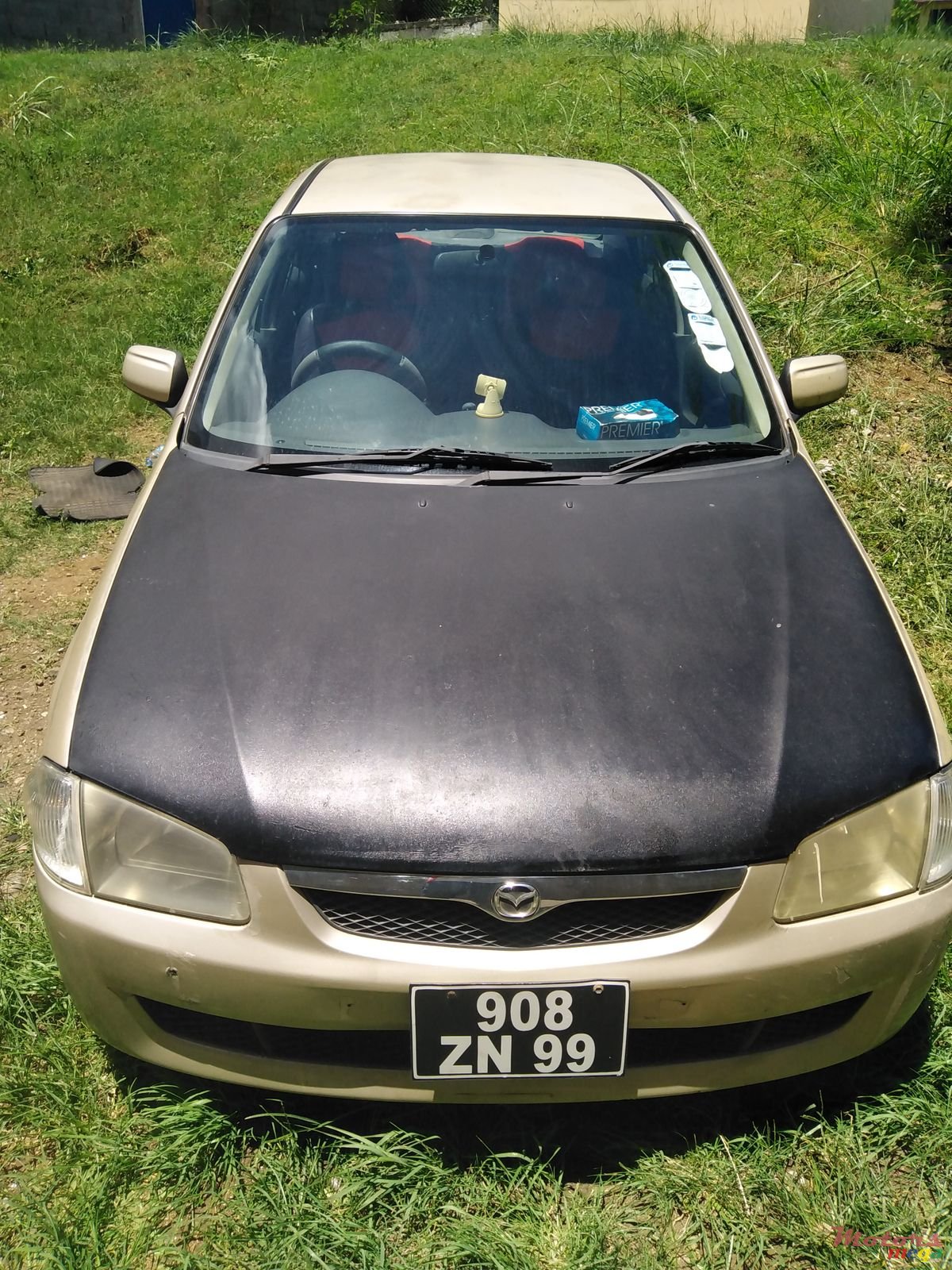 1999' Mazda 323 Japan photo #1