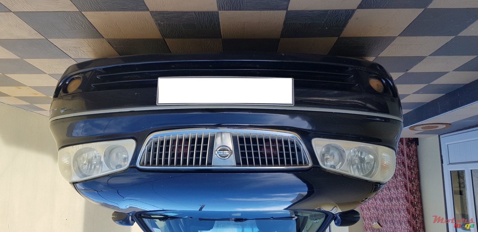 2004' Nissan Sunny photo #2