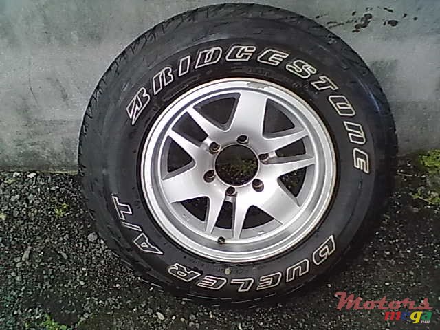 2002' Isuzu ALLOY WHEELS photo #1