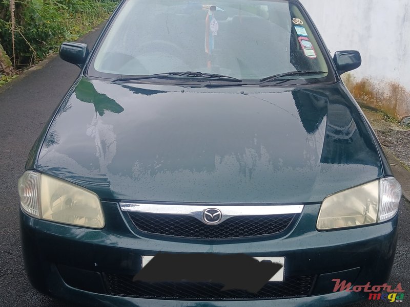 2000' Mazda 323 photo #2