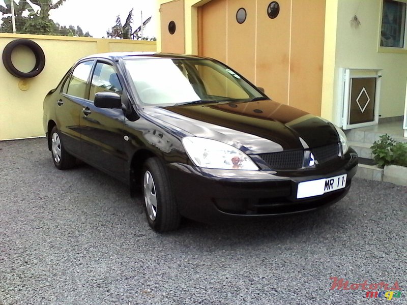 2011' Mitsubishi Lancer photo #1