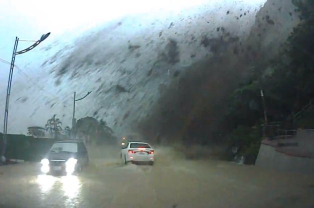 Dashcam Captures Taiwanese Motorist Escaping Mudslide, Indiana Jones-Sized Boulder