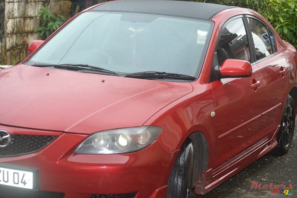 2004' Mazda 3 photo #1