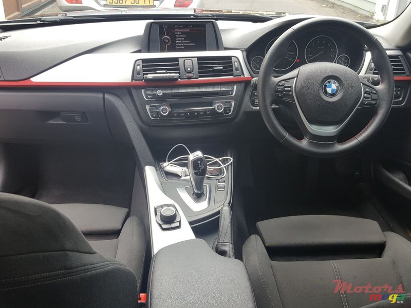 2012' BMW 316i photo #7