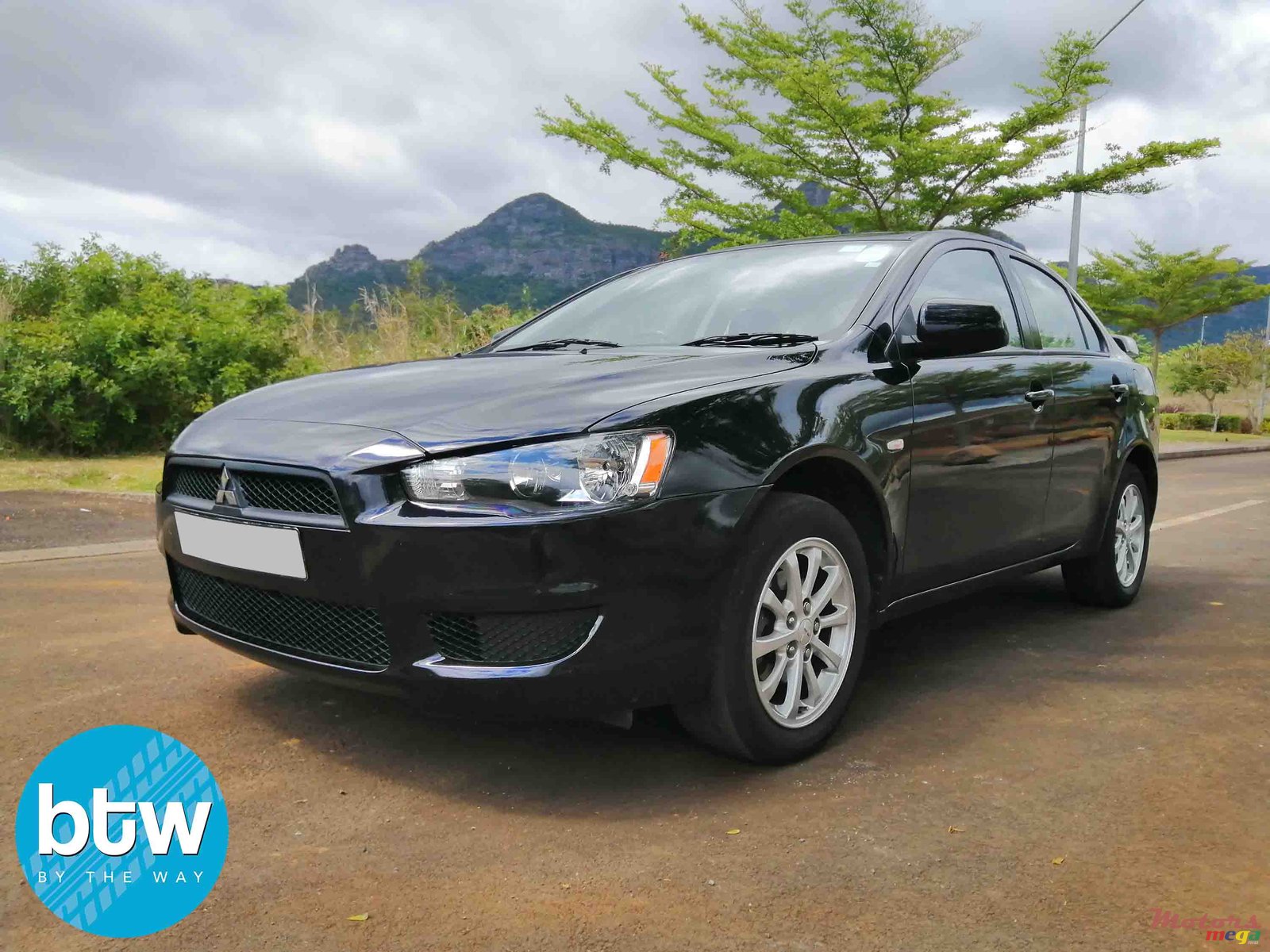 2014' Mitsubishi Lancer photo #2