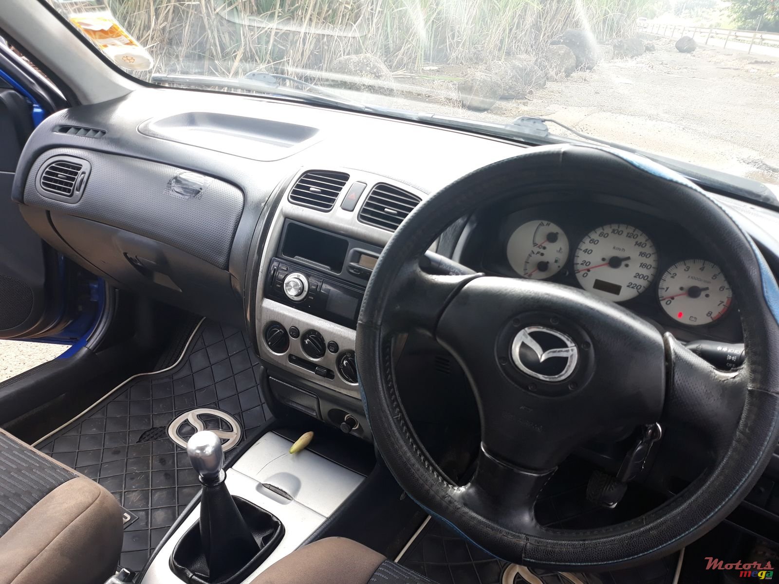 2003' Mazda 323 photo #3