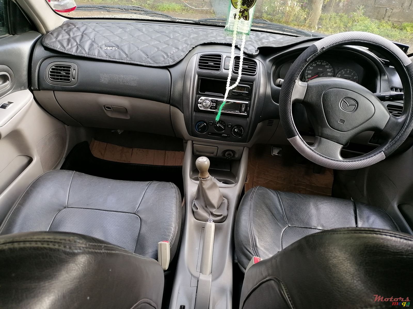 2002' Mazda 323 photo #5