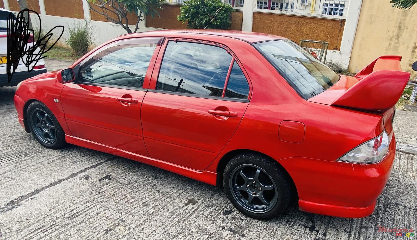 2003' Mitsubishi Lancer Glx photo #2