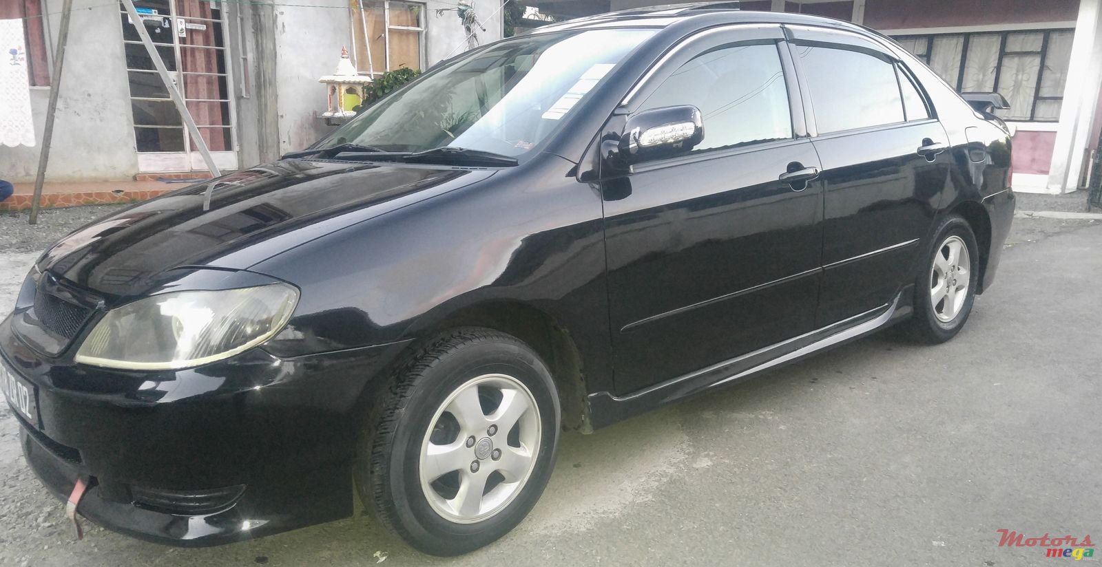 2002' Toyota Corolla NZE photo #2