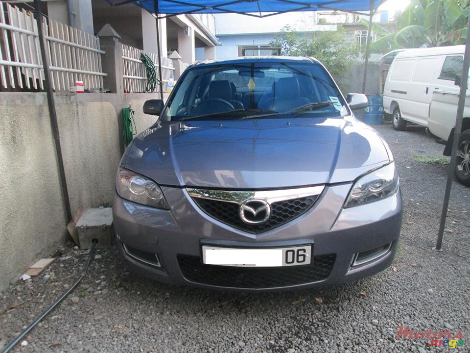 2006' Mazda 3 photo #1