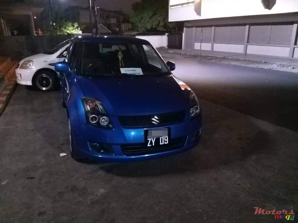 2009' Suzuki Swift photo #3