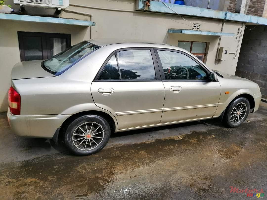 2002' Mazda 323 photo #5