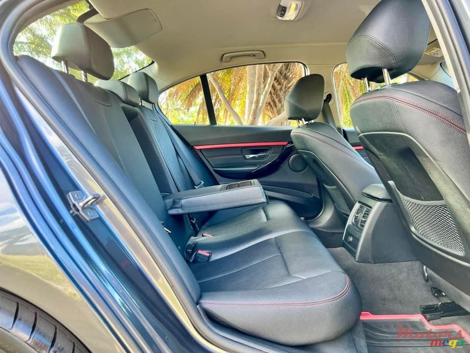 2015' BMW 320 photo #7