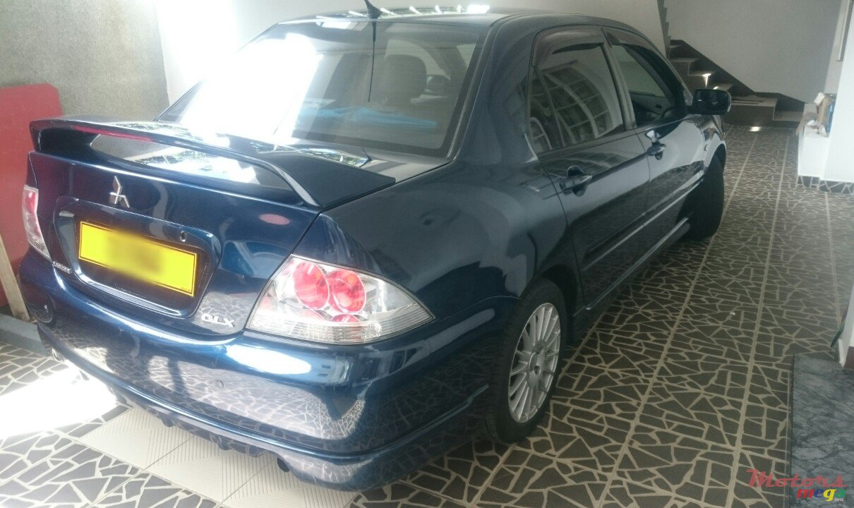 2004' Mitsubishi Lancer photo #4