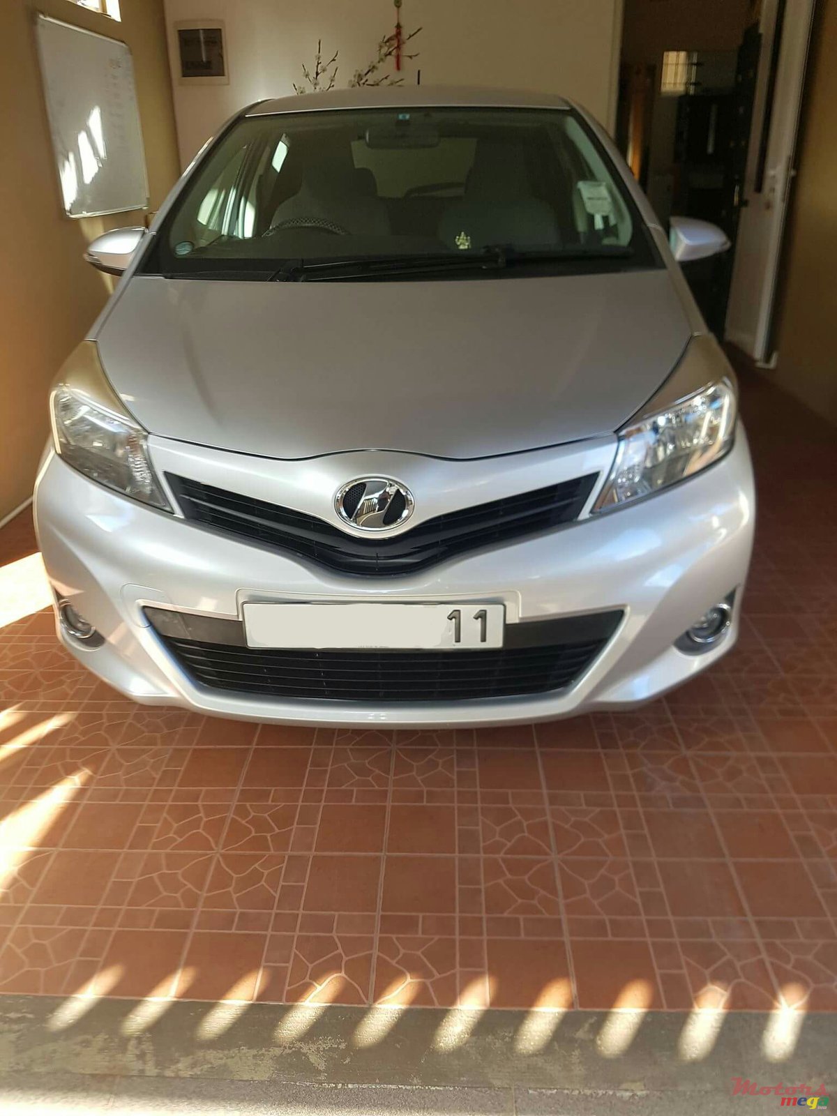 2011' Toyota Vitz photo #1