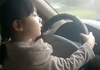 4-years-old girl takes parents for a drive