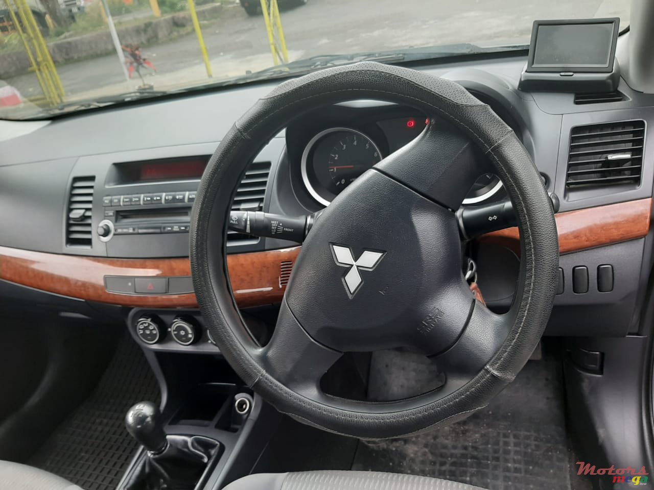 2012' Mitsubishi Lancer photo #6