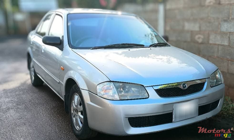 2000' Mazda 323 photo #1