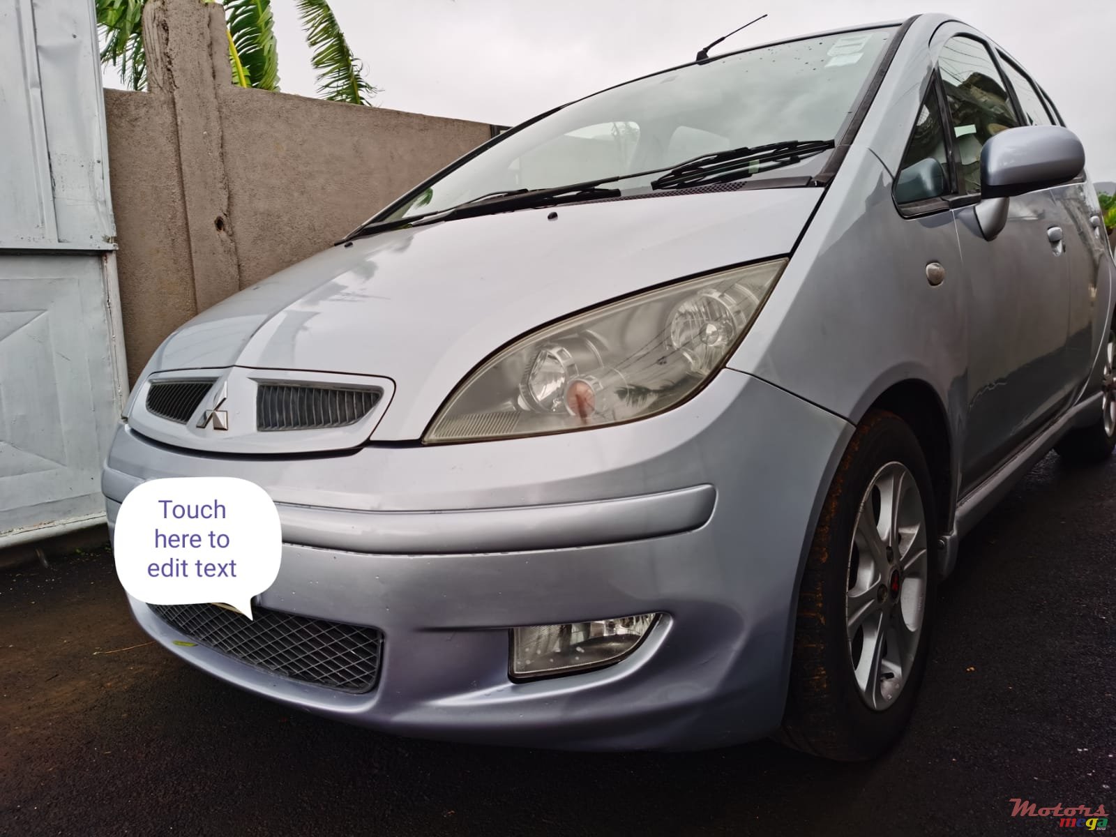 2003' Mitsubishi Colt photo #2