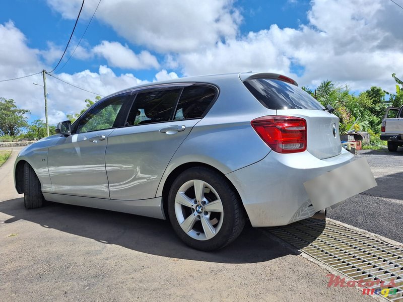 2012' BMW 116 F20 Sport photo #6