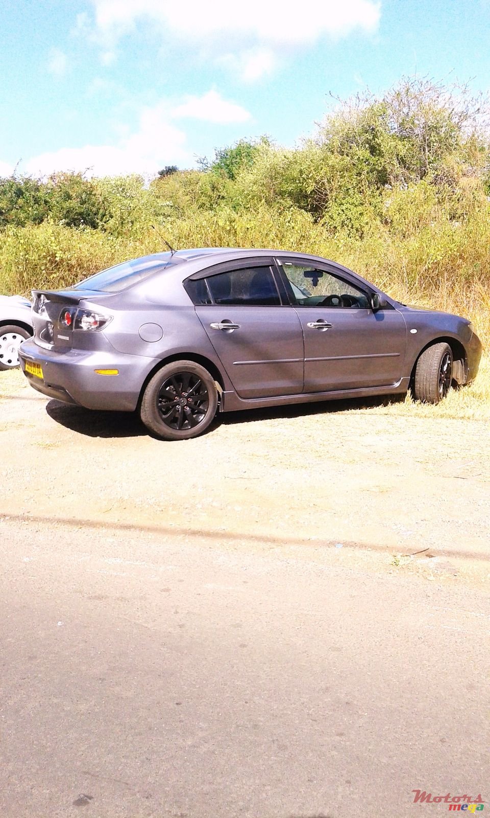 2004' Mazda 3 SEDAN photo #1