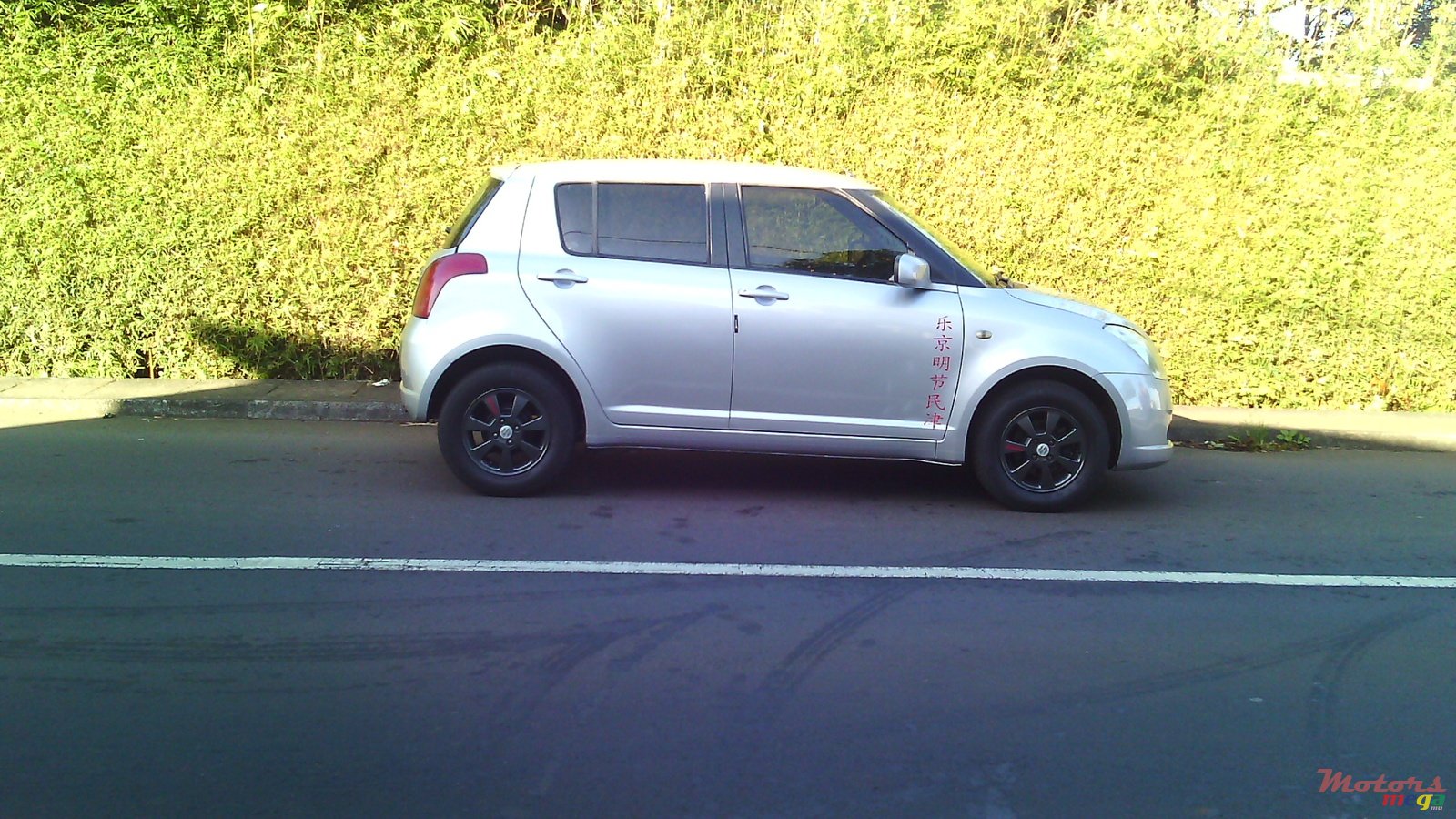 2007' Suzuki Swift photo #1