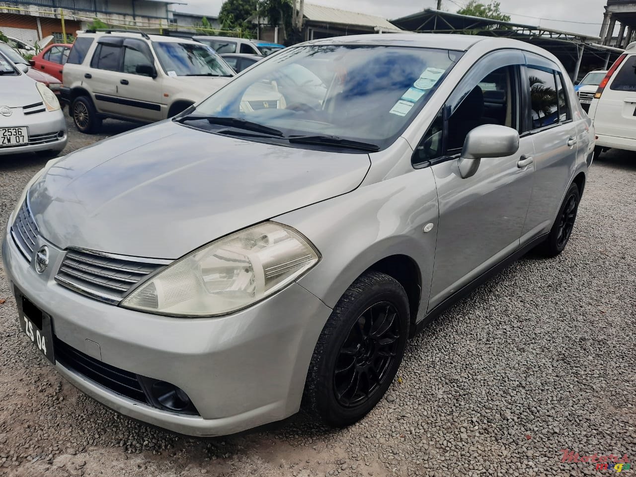 2004' Nissan Tiida photo #1