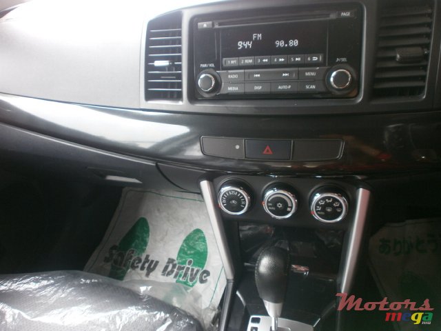 2016' Mitsubishi Lancer EX photo #4