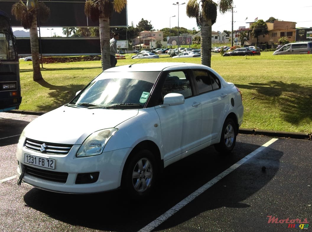 2012' Suzuki Swift Sedan photo #1