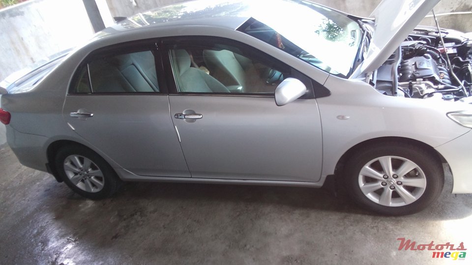 2012' Toyota Corolla G saloon photo #4