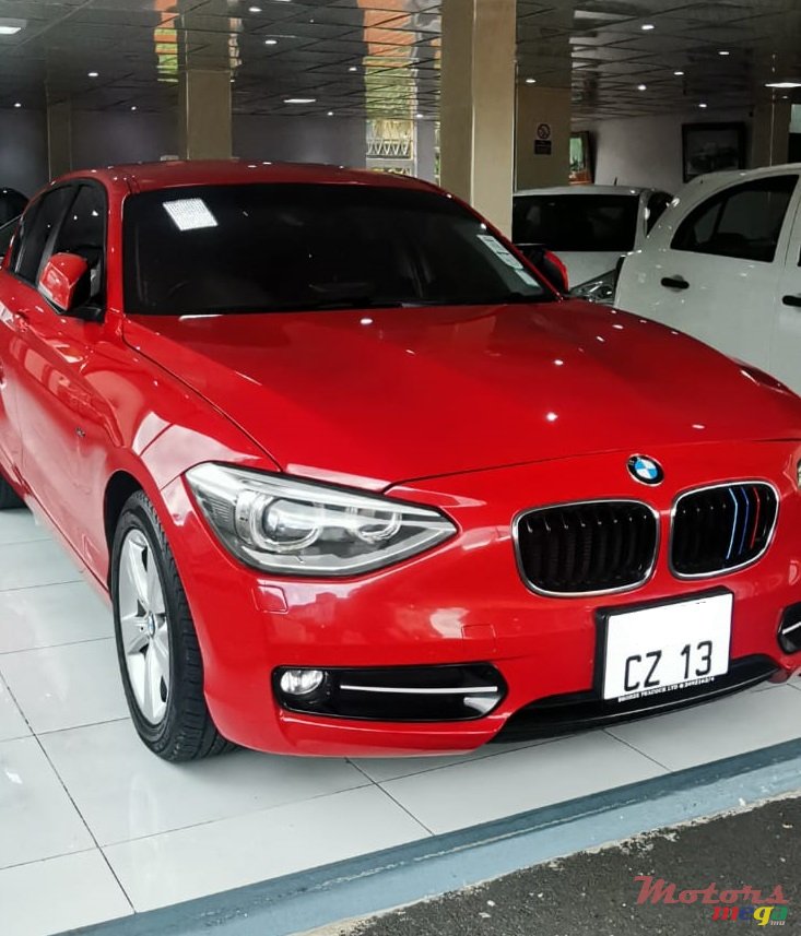 2013' BMW 116 i photo #1