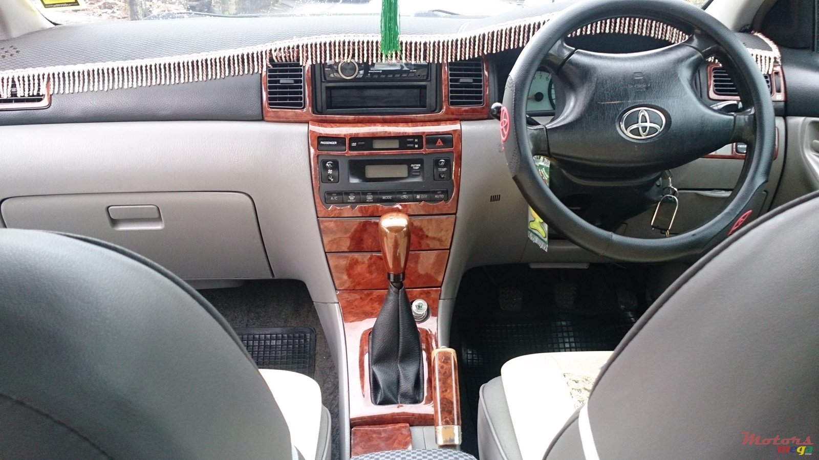 2002' Toyota Corolla nze GLI photo #1