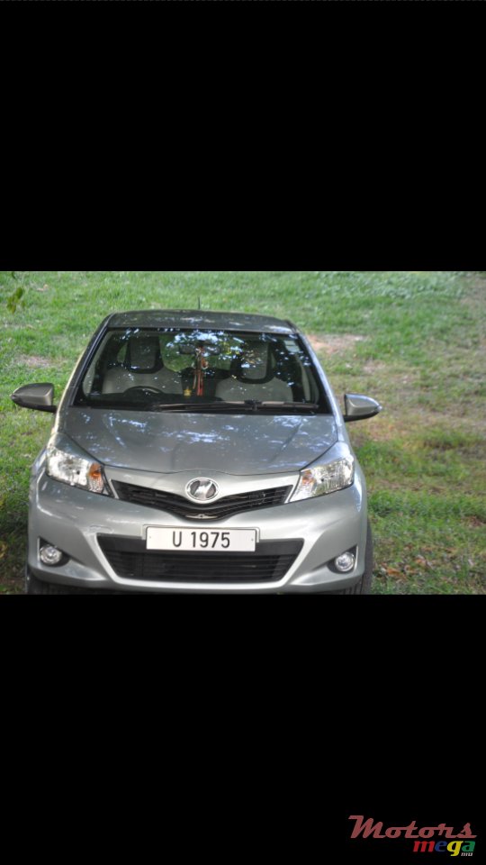 2011' Toyota Vitz photo #1