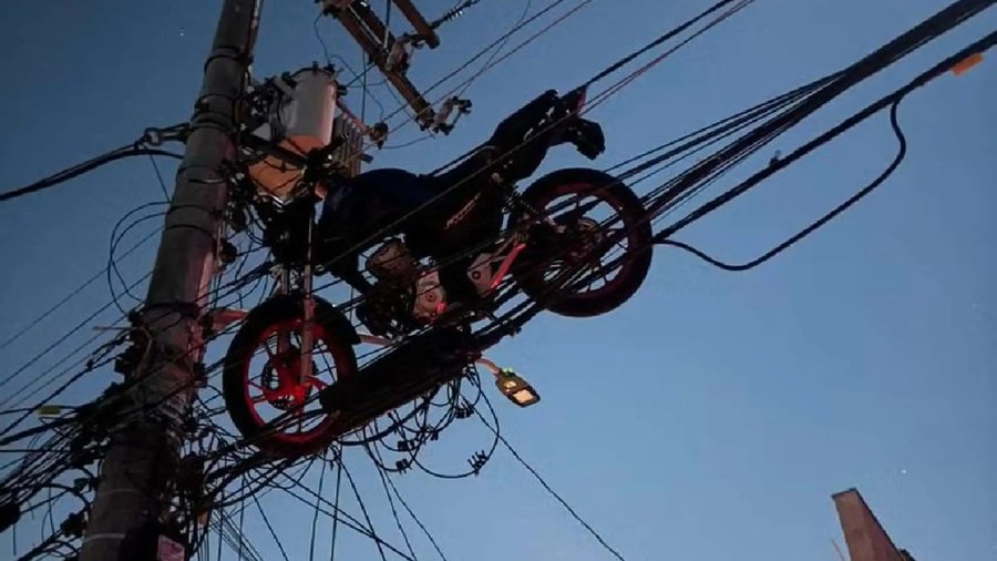 How the Hell Did This Motorcycle End up Stuck on a Telephone Pole?